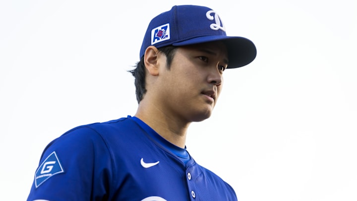 Mar 4, 2025; Phoenix, Arizona, USA; Los Angeles Dodgers designated hitter Shohei Ohtani against the Cincinnati Reds during a spring training game at Camelback Ranch-Glendale. Mandatory Credit: Mark J. Rebilas-Imagn Images