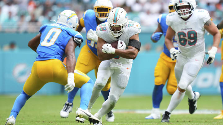 Miami Dolphins tight end Julian Hill (89) runs the ball against the Los Angeles Chargers during the fourth quarter at Hard Rock Stadium. Miami Dolphins tight end Julian Hill (89) runs the ball against the Los Angeles Chargers during the fourth quarter at Hard Rock Stadium.