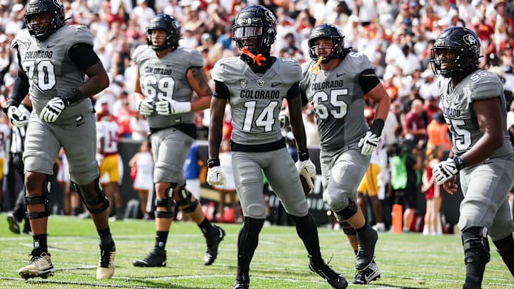 Sep 30, 2023; Boulder, Colorado, USA; Colorado Buffaloes wide receiver Omarion Miller (14) celebrates his touchdown during the game against the USC Trojans at Folsom Field. Mandatory Credit: Chet Strange-Imagn Images Sep 30, 2023; Boulder, Colorado, USA; Colorado Buffaloes wide receiver Omarion Miller (14) celebrates his touchdown during the game against the USC Trojans at Folsom Field. Mandatory Credit: Chet Strange-Imagn Images