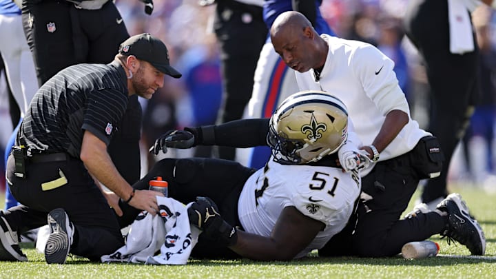 Saints RG Cesar Ruiz down of the ground after suffering an injury against the Buffalo Bills on Sep. 28. 2025.