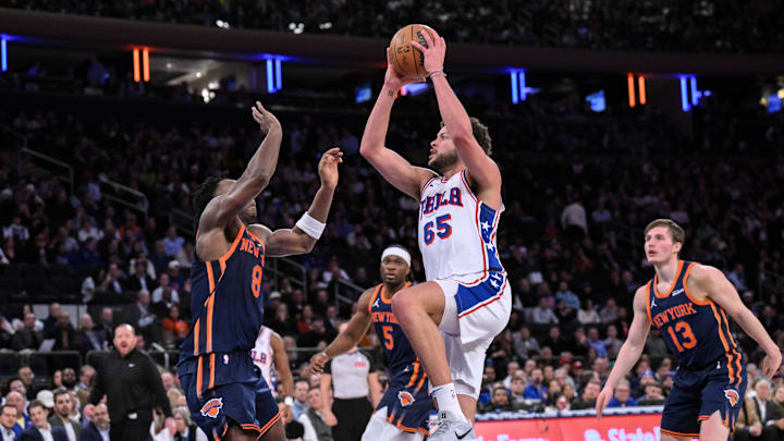 Apr 1, 2025; New York, New York, USA; Philadelphia 76ers forward Alex Reese (65) shoots the ball while being defended by New York Knicks forward OG Anunoby (8) during the second half at Madison Square Garden. Mandatory Credit: John Jones-Imagn Images Apr 1, 2025; New York, New York, USA; Philadelphia 76ers forward Alex Reese (65) shoots the ball while being defended by New York Knicks forward OG Anunoby (8) during the second half at Madison Square Garden. Mandatory Credit: John Jones-Imagn Images