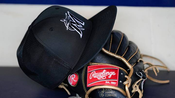 View of a Miami Marlins hat and glove View of a Miami Marlins hat and glove