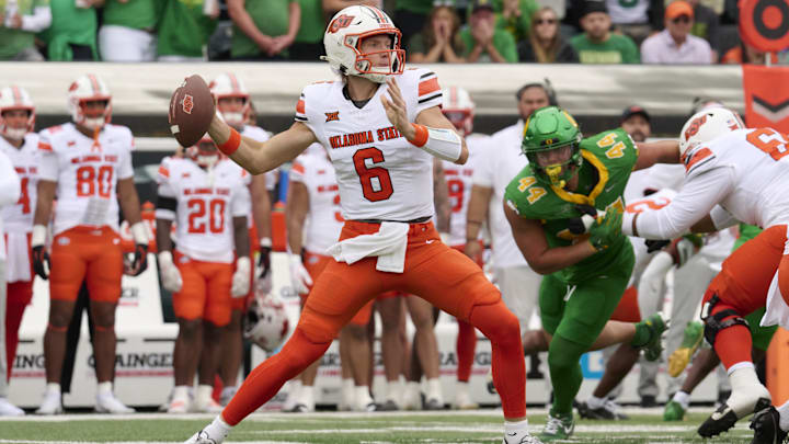 Sep 6, 2025; Eugene, Oregon, USA; Oklahoma State Cowboys quarterback Zane Flores (6) throws a pass during the first half against the Oregon Ducks at Autzen Stadium. Mandatory Credit: Troy Wayrynen-Imagn Images