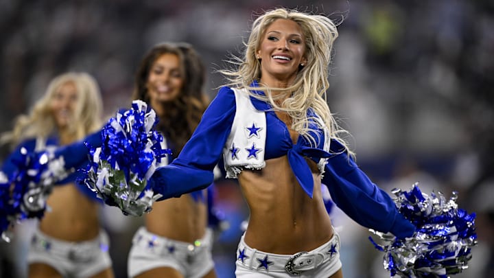 The Dallas Cowboys cheerleaders perform during the game against the Arizona Cardinals at AT&T Stadium. The Dallas Cowboys cheerleaders perform during the game against the Arizona Cardinals at AT&T Stadium.