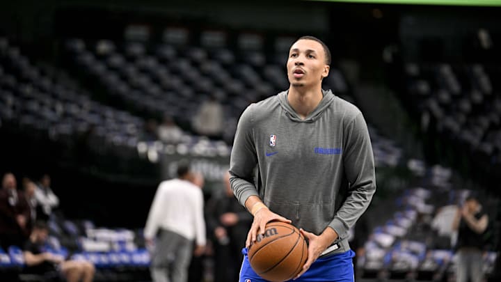 Feb 10, 2025; Dallas, Texas, USA; Dallas Mavericks guard Dante Exum (0) warms up before the game against the Sacramento Kings during the first quarter at the American Airlines Center. Mandatory Credit: Jerome Miron-Imagn Images Feb 10, 2025; Dallas, Texas, USA; Dallas Mavericks guard Dante Exum (0) warms up before the game against the Sacramento Kings during the first quarter at the American Airlines Center. Mandatory Credit: Jerome Miron-Imagn Images