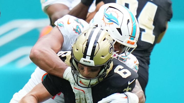 New Orleans Saints quarterback Tyler Shough (6) is sacked by Miami Dolphins linebacker Chop Robinson (44) during the second half at Hard Rock Stadium in Week 13. New Orleans Saints quarterback Tyler Shough (6) is sacked by Miami Dolphins linebacker Chop Robinson (44) during the second half at Hard Rock Stadium in Week 13.