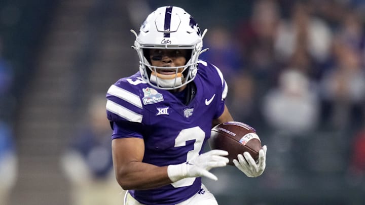 Dec 26, 2024; Phoenix, AZ, USA; Kansas State Wildcats running back Dylan Edwards (3) against the Rutgers Scarlet Knights during the Rate Bowl at Chase Field. Mandatory Credit: Mark J. Rebilas-Imagn Images