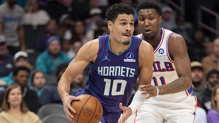 Jan 26, 2026; Charlotte, North Carolina, USA; Charlotte Hornets guard Josh Green (10) drives to the basket around Philadelphia 76ers forward Justin Edwards (11) during the second half at Spectrum Center. Mandatory Credit: Jim Dedmon-Imagn Images Jan 26, 2026; Charlotte, North Carolina, USA; Charlotte Hornets guard Josh Green (10) drives to the basket around Philadelphia 76ers forward Justin Edwards (11) during the second half at Spectrum Center. Mandatory Credit: Jim Dedmon-Imagn Images