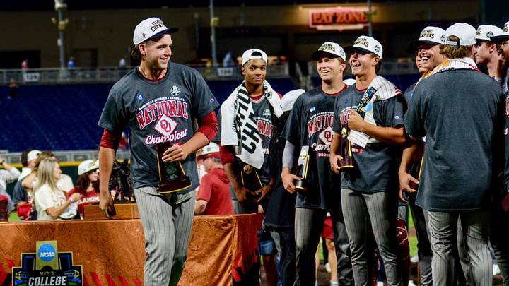 Oklahoma pitcher Cord Rager celebrates after winning the national championship.