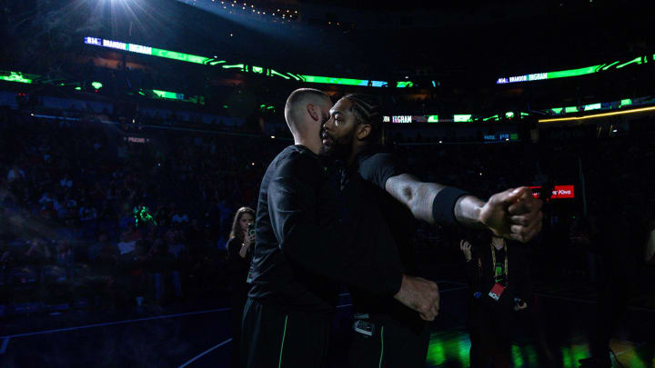 Nov 17, 2023; New Orleans, Louisiana, USA; New Orleans Pelicans forward Brandon Ingram (14) chest bumps center Jonas Valanciunas (17) before the first half against the Denver Nuggets at the Smoothie King Center. Nov 17, 2023; New Orleans, Louisiana, USA; New Orleans Pelicans forward Brandon Ingram (14) chest bumps center Jonas Valanciunas (17) before the first half against the Denver Nuggets at the Smoothie King Center.