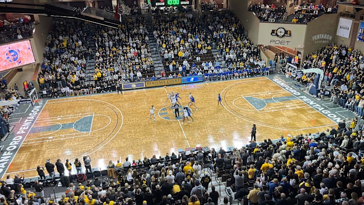 Addi O'Grady wins the opening tip-off during Iowa's women's basketball game against Kansas on Wednesday night at the Sanford Pentagon in Sioux Falls, S.D. Addi O'Grady wins the opening tip-off during Iowa's women's basketball game against Kansas on Wednesday night at the Sanford Pentagon in Sioux Falls, S.D.