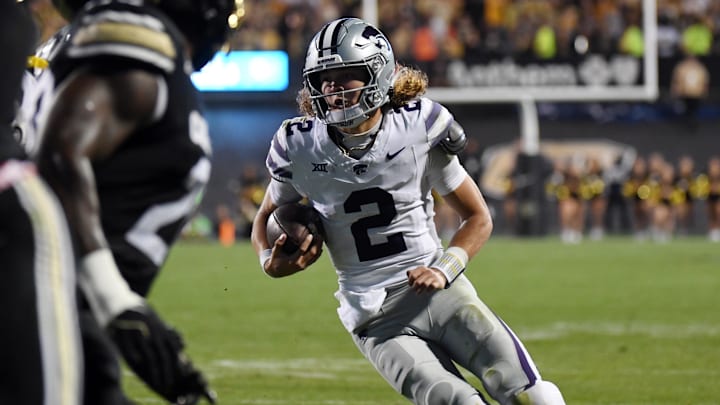 Oct 12, 2024; Boulder, Colorado, USA; Kansas State Wildcats quarterback Avery Johnson (2) runs for a touchdown during the first half against the Colorado Buffaloes at Folsom Field. Mandatory Credit: Christopher Hanewinckel-Imagn Images Oct 12, 2024; Boulder, Colorado, USA; Kansas State Wildcats quarterback Avery Johnson (2) runs for a touchdown during the first half against the Colorado Buffaloes at Folsom Field. Mandatory Credit: Christopher Hanewinckel-Imagn Images