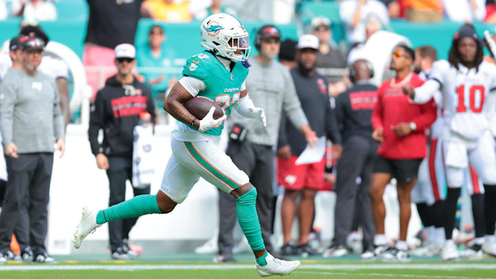 Miami Dolphins cornerback Jason Marshall Jr. (33) intercepts the football during the second quarter against the Tampa Bay Buccaneers at Hard Rock Stadium in Week 17. Miami Dolphins cornerback Jason Marshall Jr. (33) intercepts the football during the second quarter against the Tampa Bay Buccaneers at Hard Rock Stadium in Week 17.