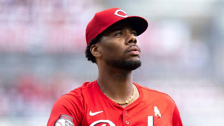 Cincinnati Reds pitcher Hunter Greene (21) walks back to the dugout