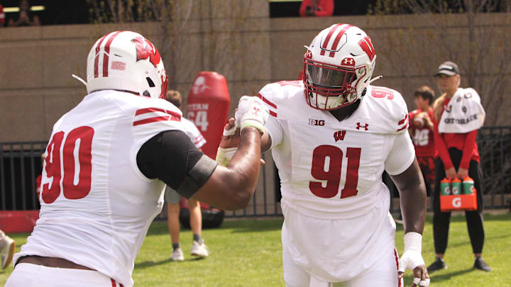 James Thompson (90) has committed to Illinois after entering the transfer portal from Wisconsin.