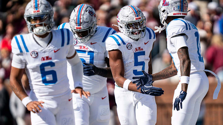Ole Miss running back Kewan Lacy (5) celebrates with Ole Miss wide receiver Deuce Alexander (11) after scoring a touchdown during a college football game between Mississippi State and Ole Miss at Davis Wade Stadium in Starkville, Miss., on Friday, Nov. 28, 2025. The Egg Bowl game marks the 122nd meeting between the two teams.