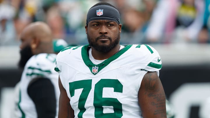 Dec 15, 2024; Jacksonville, Florida, USA; New York Jets offensive linebacker John Simpson (76) before the game against the Jacksonville Jaguars at EverBank Stadium. Mandatory Credit: Morgan Tencza-Imagn Images