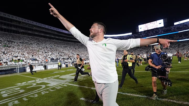 Sep 27, 2025; University Park, Pennsylvania, USA; Oregon Ducks head coach Dan Lanning reacts after defeating the Penn State Nittany Lions at Beaver Stadium. 