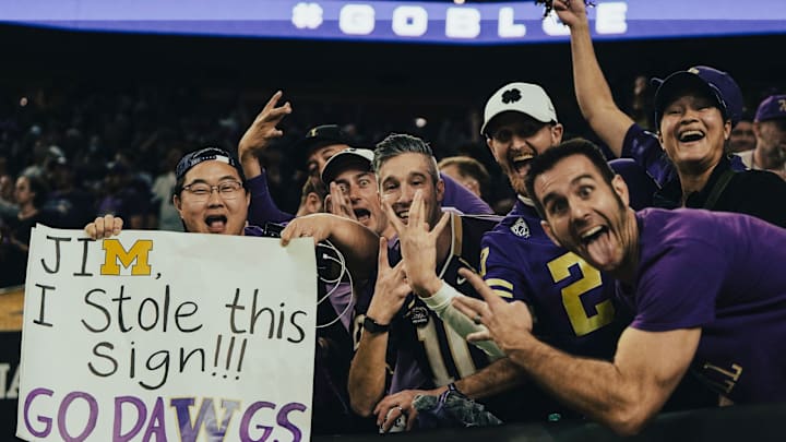Husky fans enjoy themselves at the 2024 CFP national championship game against Michigan. Husky fans enjoy themselves at the 2024 CFP national championship game against Michigan.