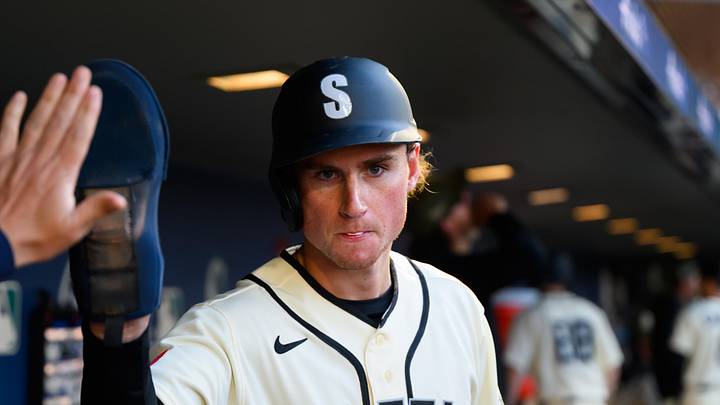 May 17, 2026; Seattle, Washington, USA; Seattle Mariners third baseman Colt Emerson (4) celebrates after scoring a run against the San Diego Padres during the sixth inning at T-Mobile Park. Mandatory Credit: Steven Bisig-Imagn Images