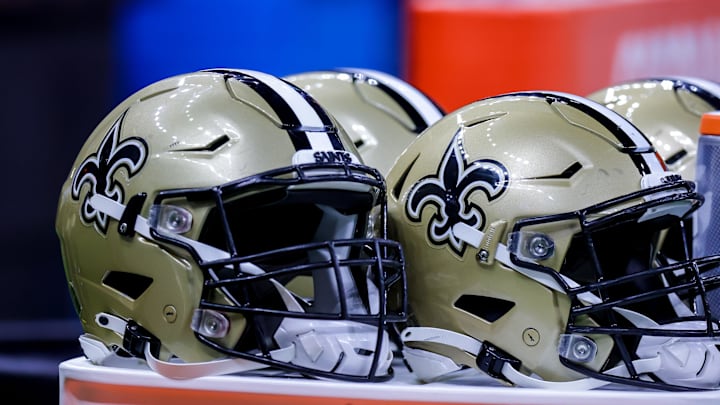 Aug 23, 2021; New Orleans, Louisiana, USA;  New Orleans Saints helmets during the game between the New Orleans Saints and the Jacksonville Jaguars during the first half at Caesars Superdome. Mandatory Credit: Stephen Lew-Imagn Images
