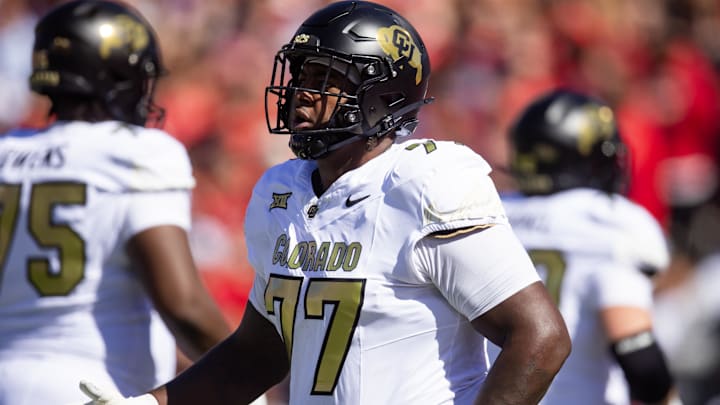 Oct 19, 2024; Tucson, Arizona, USA; Colorado Buffalos offensive tackle Jordan Seaton (77) against the Arizona Wildcats at Arizona Stadium. Mandatory Credit: Mark J. Rebilas-Imagn Images