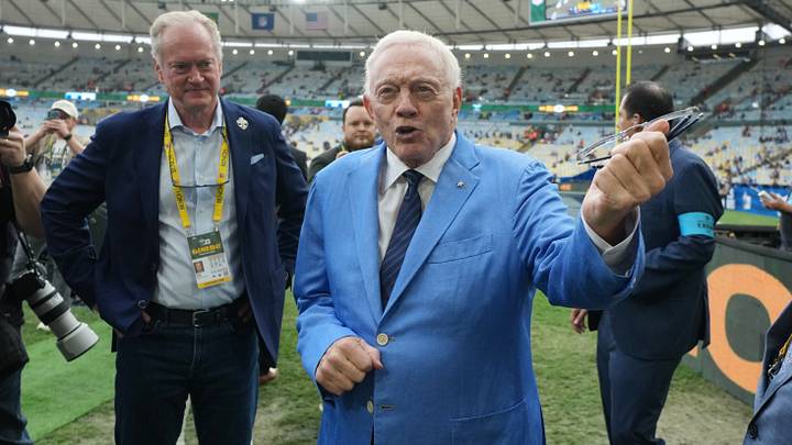 Dallas Cowboys owner Jerry Jones talks on the field before the game between Baltimore Ravens and Dallas Cowboys at Maracana Stadium.  Mandatory Credit: Kirby Lee-Imagn Images
