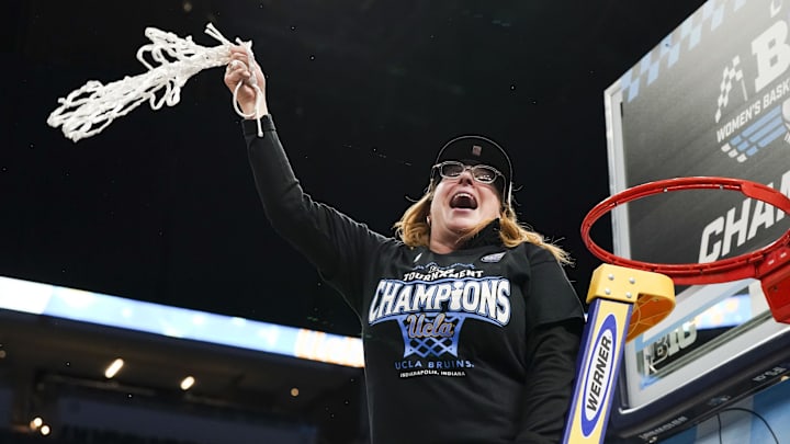 Mar 8, 2025; Indianapolis, IN, USA; UCLA Bruins head coach Cori Close reacts after cutting the net for the Big Ten Conference Championship against USC Trojans at Gainbridge Fieldhouse. The UCLA Bruins won 72-67 in the B1G Women’s Basketball Tournament.  Mandatory Credit: Stephanie Amador Blondet-Imagn Images 