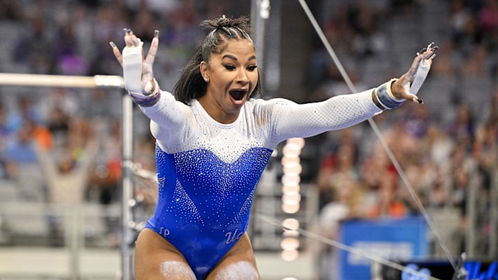 Apr 17, 2025; Fort Worth, TX, USA; UCLA Bruins gymnast Jordan Chiles performs on uneven bars during the 2025 Women's National Gymnastics Semifinal at Dickies Arena. Mandatory Credit: Jerome Miron-Imagn Images