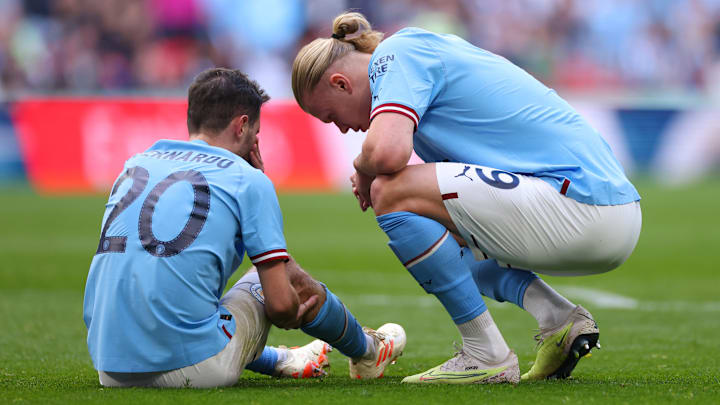 Bernardo Silva chatting with Erling Haaland during City's FA Cup semi-final clash with Sheffield United