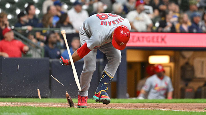 Sep 3, 2024; Milwaukee, Wisconsin, USA; St. Louis Cardinals third base Nolan Arenado (28) smashes his bat after grounding out against the Milwaukee Brewers in the eighth inning at American Family Field. Mandatory Credit: Michael McLoone-Imagn Images