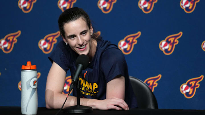 Jun 19, 2025; San Francisco, California, USA; Indiana Fever guard Caitlin Clark (22) talks to media members before the game against the Golden State Valkyries at Chase Center. Mandatory Credit: Darren Yamashita-Imagn Images
