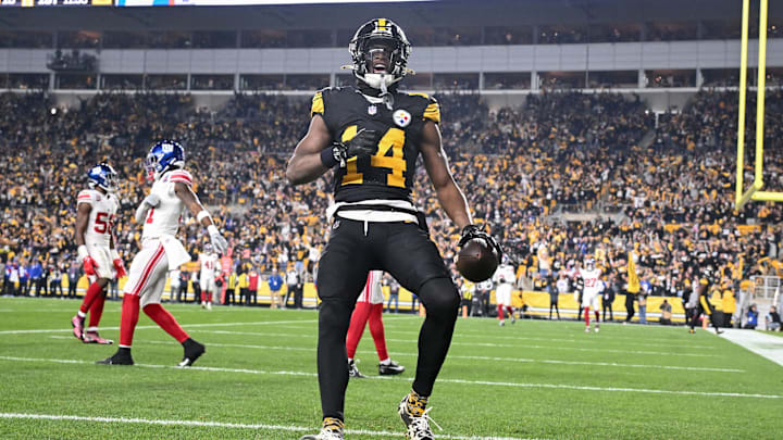 Oct 28, 2024; Pittsburgh, Pennsylvania, USA; Pittsburgh Steelers wide receiver George Pickens (14) celebrates a touchdown pass that was called back for a penalty against the New York Giants during the first half at Acrisure Stadium. Mandatory Credit: Barry Reeger-Imagn Images