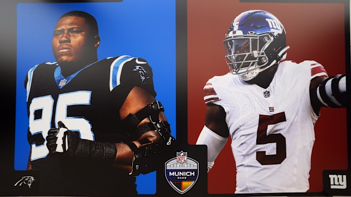 Nov 7, 2024; Munich, Germany; A display featuring images of Carolina Panthers defensive end Derrick Brown (95) and New York Giants linebacker Kayvon Thibodeaux (5) at the Sport Galeria store. Mandatory Credit: Kirby Lee-Imagn Images