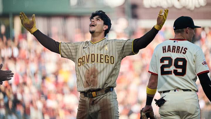 Sep 13, 2026; San Francisco, California, USA; San Diego Padres catcher Ethan Salas (8) reacts at third base after hitting a triple against San Francisco Giants starting pitcher Logan Webb (not pictured) during the fourth inning at Oracle Park. Mandatory Credit: Robert Edwards-Imagn Images Sep 13, 2026; San Francisco, California, USA; San Diego Padres catcher Ethan Salas (8) reacts at third base after hitting a triple against San Francisco Giants starting pitcher Logan Webb (not pictured) during the fourth inning at Oracle Park. Mandatory Credit: Robert Edwards-Imagn Images