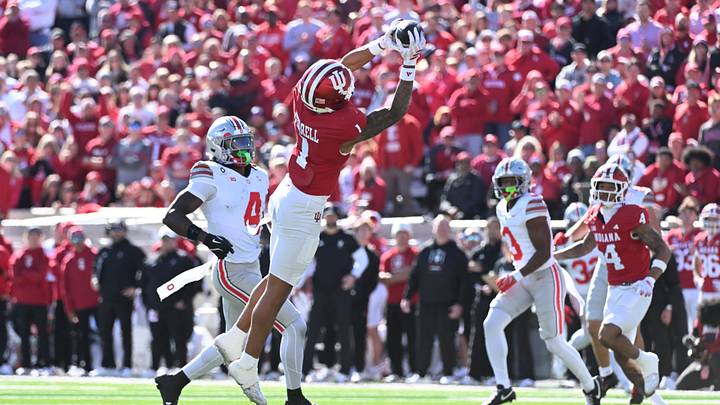 Oct 17, 2026; Bloomington, Indiana, USA; Indiana Hoosiers defensive back Amare Ferrell (1) intercepts a pass in front of Ohio State Buckeyes wide receiver Jeremiah Smith (4) during the second half at Merchants Bank Field at Memorial Stadium. Mandatory Credit: Robert Goddin-Imagn Images Oct 17, 2026; Bloomington, Indiana, USA; Indiana Hoosiers defensive back Amare Ferrell (1) intercepts a pass in front of Ohio State Buckeyes wide receiver Jeremiah Smith (4) during the second half at Merchants Bank Field at Memorial Stadium. Mandatory Credit: Robert Goddin-Imagn Images