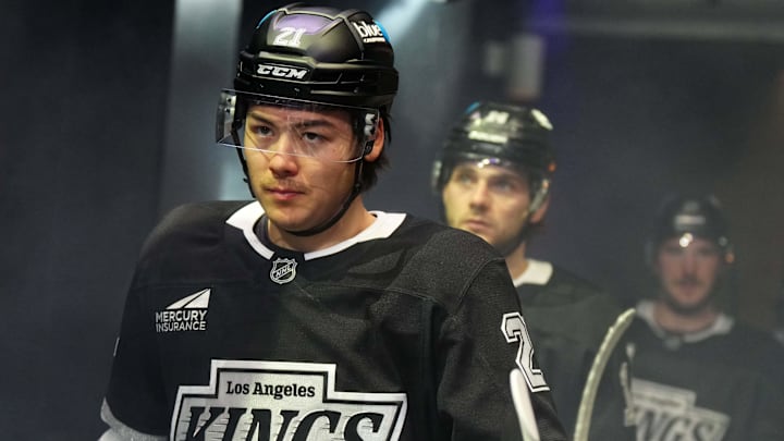 Mar 11, 2025; Los Angeles, California, USA; LA Kings defenseman Jordan Spence (21) enters the ice against the New York Islanders in the third period at the Crypto.com Arena. Mandatory Credit: Kirby Lee-Imagn Images