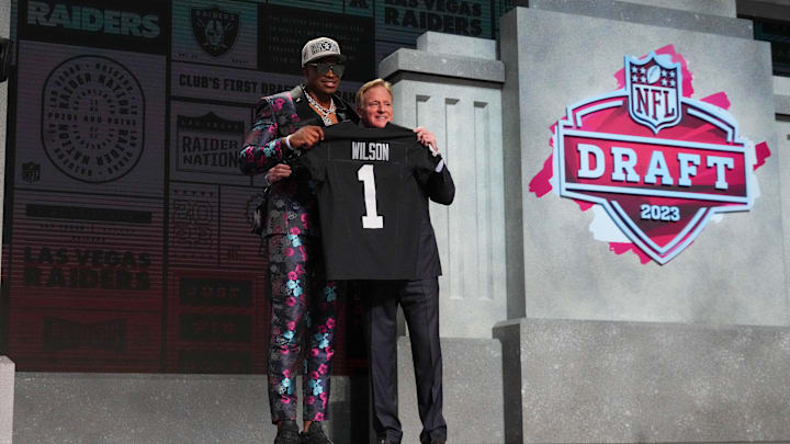 Apr 27, 2023; Kansas City, MO, USA;  Texas Tech defensive end Tyree Wilson with NFL commissioner Roger Goodell after being selected by the Las Vegas Raiders seventh overall in the first round of the 2023 NFL Draft at Union Station. Mandatory Credit: Kirby Lee-Imagn Images