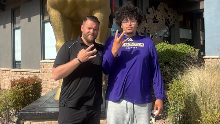 UW line coach Michael Switzer has a home visit with Las Vegas prospect Dom Harris.