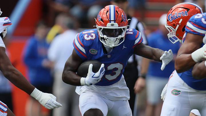 Florida running back Jadan Baugh (13) runs during the second half of the Orange and Blue game at Steve Spurrier Field at Ben Hill Griffin Stadium in Gainesville, FL on Saturday, April 11, 2026. [Alan Youngblood/Gainesville Sun]