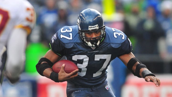 Jan. 5, 2008; Seattle, WA, USA; Seattle Seahawks running back Shaun Alexander (37) rushes the ball against the Washington Redskins during the NFC wild card game at Qwest Field. Seattle defeated Washington 35-14. Mandatory Credit: Mark J. Rebilas-Imagn Images Jan. 5, 2008; Seattle, WA, USA; Seattle Seahawks running back Shaun Alexander (37) rushes the ball against the Washington Redskins during the NFC wild card game at Qwest Field. Seattle defeated Washington 35-14. Mandatory Credit: Mark J. Rebilas-Imagn Images