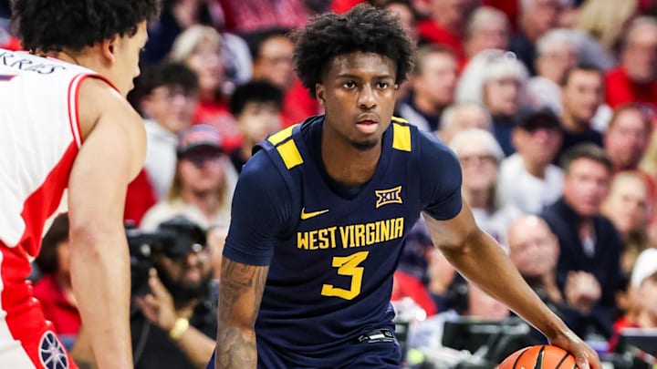 Jan 24, 2026; Tucson, Arizona, USA; West Virginia Mountaineers guard Honor Huff (3) dribbles the ball during the first half of the game against the Arizona Wildcats at McKale Memorial Center. Mandatory Credit: Aryanna Frank-Imagn Images