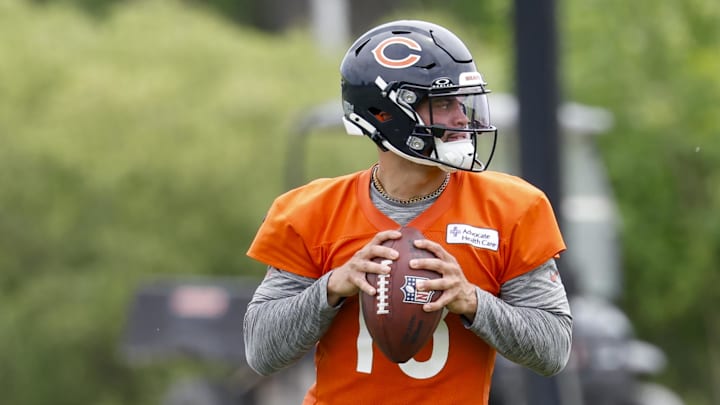 Chicago Bears quarterback Caleb Williams (18) looks to pass the ball during minicamp at Halas Hall. 