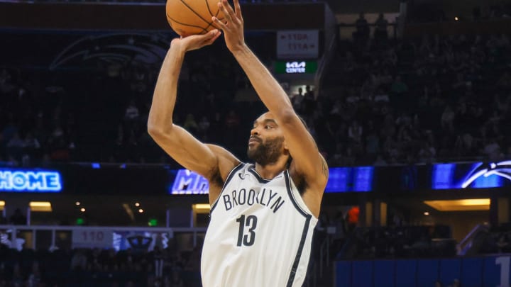 Feb 27, 2024; Orlando, Florida, USA; Brooklyn Nets forward Keita Bates-Diop (13) shoots the ball during the second half against the Orlando Magic at Amway Center. Mandatory Credit: Mike Watters-USA TODAY Sports