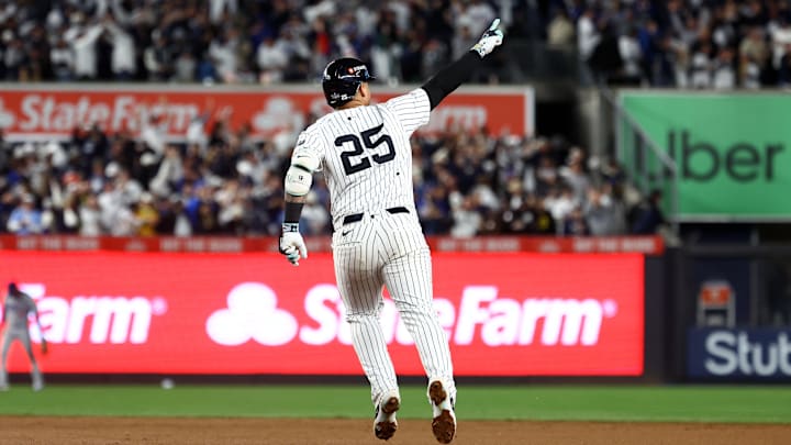 Oct 29, 2024; Bronx, New York, USA;  New York Yankees second baseman Gleyber Torres (25) reacts after hitting a three run home run against the Los Angeles Dodgers in the eighth inning during game four of the 2024 MLB World Series at Yankee Stadium.
