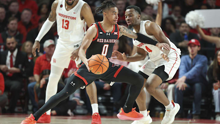 Jan 17, 2024; Houston, Texas, USA; Texas Tech Red Raiders guard Chance McMillian (0) controls the