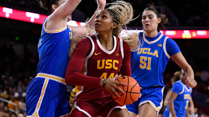 USC Trojans forward Kiki Iriafen (44) tries to score between UCLA Bruins forward Angela Dugalic (32) and UCLA Bruins center Lauren USC Trojans forward Kiki Iriafen (44) tries to score between UCLA Bruins forward Angela Dugalic (32) and UCLA Bruins center Lauren