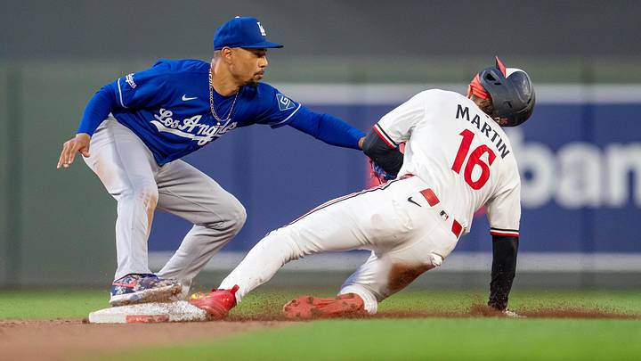 Jun 22, 2026; Minneapolis, Minnesota, USA; Los Angeles Dodgers shortstop Mookie Betts (50) tags out Minnesota Twins center fielder Austin Martin (16) in the eighth inning at Target Field. Mandatory Credit: Jesse Johnson-Imagn Images Jun 22, 2026; Minneapolis, Minnesota, USA; Los Angeles Dodgers shortstop Mookie Betts (50) tags out Minnesota Twins center fielder Austin Martin (16) in the eighth inning at Target Field. Mandatory Credit: Jesse Johnson-Imagn Images