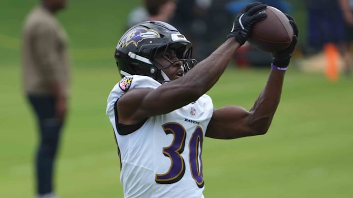 Jul 24, 2025; Owings Mills, MD, USA; Baltimore Ravens cornerback Reuben Lowery (30) runs drills during training camp at the Under Armour Performance Center. Mandatory Credit: Mitch Stringer-Imagn Images Jul 24, 2025; Owings Mills, MD, USA; Baltimore Ravens cornerback Reuben Lowery (30) runs drills during training camp at the Under Armour Performance Center. Mandatory Credit: Mitch Stringer-Imagn Images