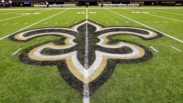 Oct 30, 2022; New Orleans, Louisiana, USA;  General view of the New Orleans Saints logo as the midfield logo fleur-de-lis after the game between the New Orleans Saints and the Las Vegas Raiders at Caesars Superdome. Mandatory Credit: Stephen Lew-Imagn Images